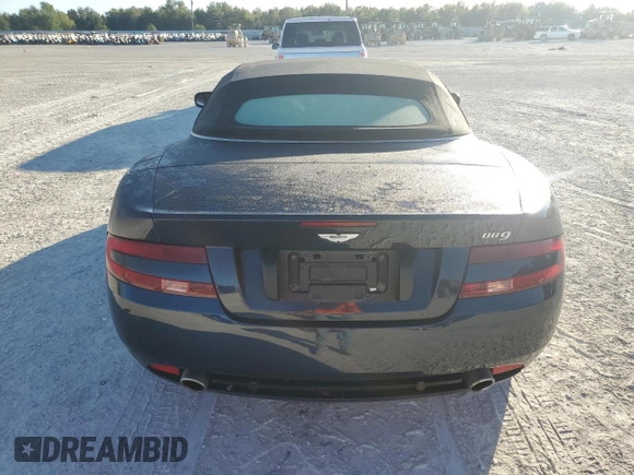 2006 Aston Martin DB9 z VIN SCFAB02A96GB04608, wystawiony jako Copart lot #76550654 z przebiegiem Nie podano mil oraz Nie do naprawy. Historia ofert i sprzedaży dostępna na DreamBid. Obrazek 6.
