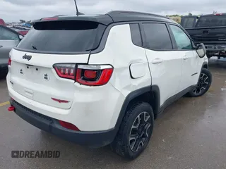 2020 Jeep Compass Trailhawk z VIN 3C4NJDDB6LT126585, wystawiony jako IAAI lot #42210794 z przebiegiem 132 220 mil mil oraz . Historia ofert i sprzedaży dostępna na DreamBid. Obrazek 4.