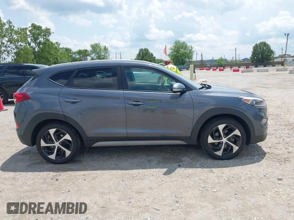 2018 Hyundai Tucson Sport z VIN KM8J3CAL9JU752050, wystawiony jako IAAI lot #42558721 z przebiegiem 173 974 mil mil oraz . Historia ofert i sprzedaży dostępna na DreamBid. Obrazek 13.