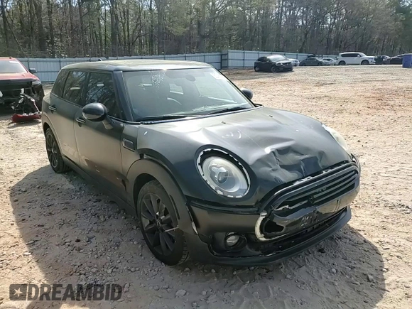 2016 MINI Clubman z VIN WMWLN5C50G2E29737, wystawiony jako Copart lot #50459135 z przebiegiem 129 940 mil mil oraz Szkody całkowita. Historia ofert i sprzedaży dostępna na DreamBid. Obrazek 12.