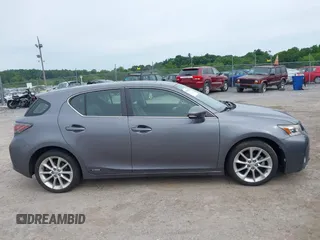 2012 Lexus CT 200h z VIN JTHKD5BH1C2063001, wystawiony jako IAAI lot #42329916 z przebiegiem 123 097 mil mil oraz . Historia ofert i sprzedaży dostępna na DreamBid. Obrazek 13.