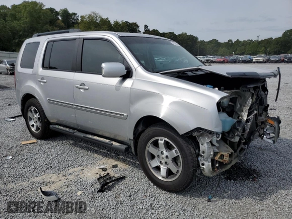 2010 Honda Pilot Touring with VIN 5FNYF3H82AB011212, listed as a Copart auction lot 71115874 with 248,495 mi miles and Salvage Title. Bid and sale history available at DreamBid. Image 4.
