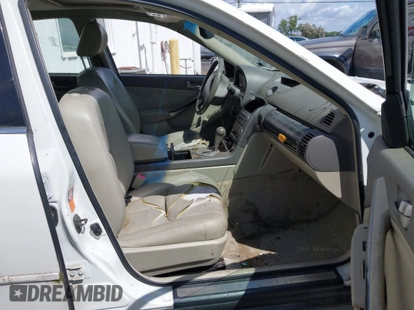 2004 Infiniti G35 w/Leather with VIN JNKCV51E84M616564, listed as a IAAI auction lot 42239573 with 263,105 mi miles and . Bid and sale history available at DreamBid. Image 5.