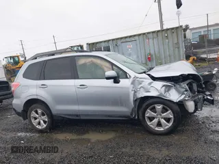 2014 Subaru Forester 2.5i Premium with VIN JF2SJAEC4EH542243, listed as a IAAI auction lot 41858364 with 100,095 mi miles. Bid and sale history available at carsss.com. Image 13.