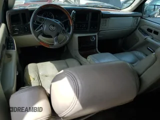 2004 Cadillac Escalade z VIN 1GYEK63N54R256740, wystawiony jako Copart lot #58633795 z przebiegiem 245 335 mil mil oraz Czysty tytuł • Clean title. Historia ofert i sprzedaży dostępna na DreamBid. Obrazek 8.