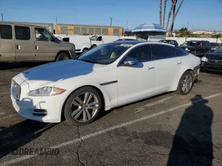 2014 Jaguar XJ with VIN SAJWA2GZ7E8V66626, listed as a Copart auction lot 78824254 with 132,720 mi miles and Salvage Title. Bid and sale history available at carsss.com. Image 1.