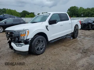 2021 Ford F-150 XL with VIN 1FTFW1E59MFA70313, listed as a Copart auction lot 60793215 with 52,387 mi miles and Salvage title. Bid and sale history available at DreamBid. Image 1.