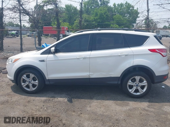 2013 Ford Escape SE z VIN 1FMCU9GXXDUD82847, wystawiony jako IAAI lot #42436360 z przebiegiem 142 071 mil mil oraz . Historia ofert i sprzedaży dostępna na DreamBid. Obrazek 13.