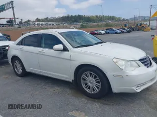 2007 Chrysler Sebring Touring with VIN 1C3LC56R07N536102, listed as a IAAI auction lot 41902390 with 203,037 mi miles and . Bid and sale history available at DreamBid. Image 1.