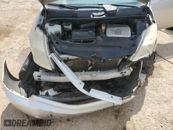 2004 Toyota Prius z VIN JTDKB20UX40033028, wystawiony jako Copart lot #57032515 z przebiegiem 279 143 mil mil oraz Szkoda całkowita • Salvage title. Historia ofert i sprzedaży dostępna na DreamBid. Obrazek 11.