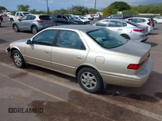 1999 Toyota Camry LE z VIN JT2BF22K9X0222119, wystawiony jako IAAI lot #41529258 z przebiegiem 119 919 mil mil oraz . Historia ofert i sprzedaży dostępna na DreamBid. Obrazek 3.
