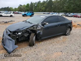 2007 Scion tC Spec z VIN JTKDE167570179636, wystawiony jako Copart lot #51235535 z przebiegiem 184 645 mil mil oraz Szkoda całkowita • Salvage title. Historia ofert i sprzedaży dostępna na DreamBid. Obrazek 1.