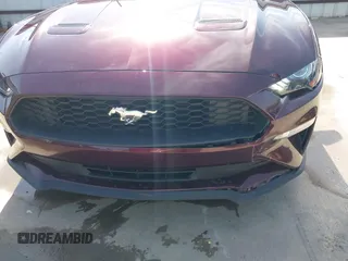 2018 Ford Mustang EcoBoost z VIN 1FA6P8TH3J5132136, wystawiony jako IAAI lot #41741496 z przebiegiem 62 526 mil mil oraz . Historia ofert i sprzedaży dostępna na DreamBid. Obrazek 6.
