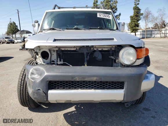 2007 Toyota FJ Cruiser with VIN JTEBU11F570090497, listed as a Copart auction lot 52139245 with 212,168 mi miles and Salvage Title. Bid and sale history available at carsss.com. Image 5.