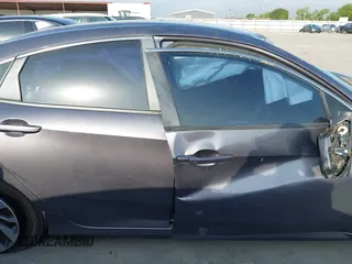 2017 Honda Civic EX z VIN 19XFC2F7XHE056273, wystawiony jako IAAI lot #42087934 z przebiegiem 95 871 mil mil oraz . Historia ofert i sprzedaży dostępna na DreamBid. Obrazek 14.