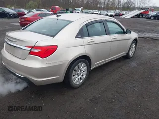 2014 Chrysler 200 LX with VIN 1C3CCBAB2EN213983, listed as a IAAI auction lot 42006774 with 80,615 mi miles and . Bid and sale history available at carsss.com. Image 4.