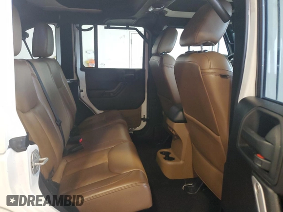 2015 Jeep Wrangler Unlimited Sahara с VIN 1C4HJWEG0FL560973, выставлен на аукционе Copart как лот 59552135 с пробегом 135 057 миль миль и Чистый • Clean title. История ставок и продаж доступна на DreamBid. Изображение 11.