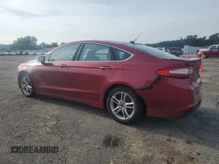 2015 Ford Fusion Titanium Hybrid with VIN 3FA6P0RU6FR116720, listed as a Copart auction lot 63573695 with 305,961 mi miles and Non repairable. Bid and sale history available at DreamBid. Image 2.