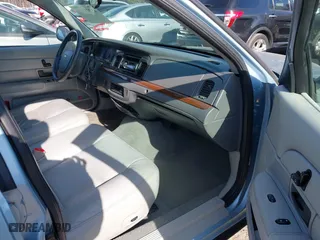 2005 Ford Crown Victoria LX with VIN 2FAFP74W65X135964, listed as a IAAI auction lot 41271175 with 82,494 mi miles. Bid and sale history available at carsss.com. Image 5.