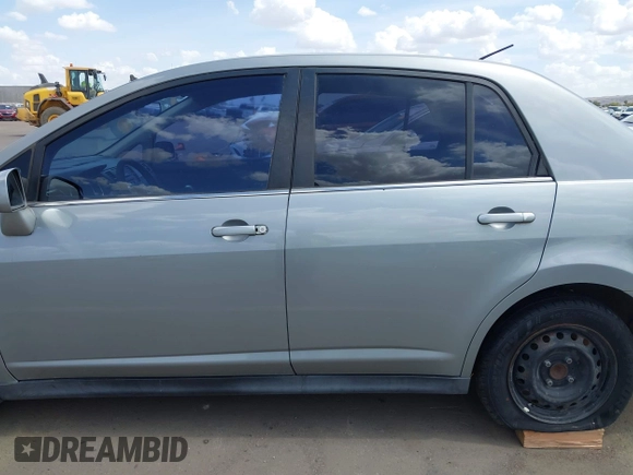 2009 Nissan Versa 1.8 S with VIN 3N1BC11E39L381507, listed as a IAAI auction lot 41956643 with 120,730 mi miles. Bid and sale history available at carsss.com. Image 15.