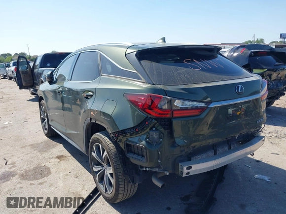 2021 Lexus RX 350 with VIN 2T2HZMAA2MC199129, listed as a IAAI auction lot 41990653 with 60,574 mi miles and . Bid and sale history available at DreamBid. Image 3.