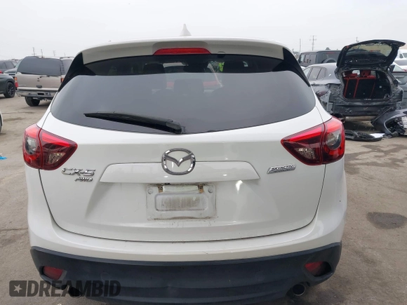 2016 Mazda CX-5 Grand Touring with VIN JM3KE4DY7G0737232, listed as a IAAI auction lot 42158279 with Not Provided miles and . Bid and sale history available at DreamBid. Image 16.