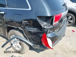 2011 Jeep Grand Cherokee Laredo with VIN 1J4RR4GG1BC534787, listed as a IAAI auction lot 42486840 with 186,229 mi miles and . Bid and sale history available at DreamBid. Image 6.