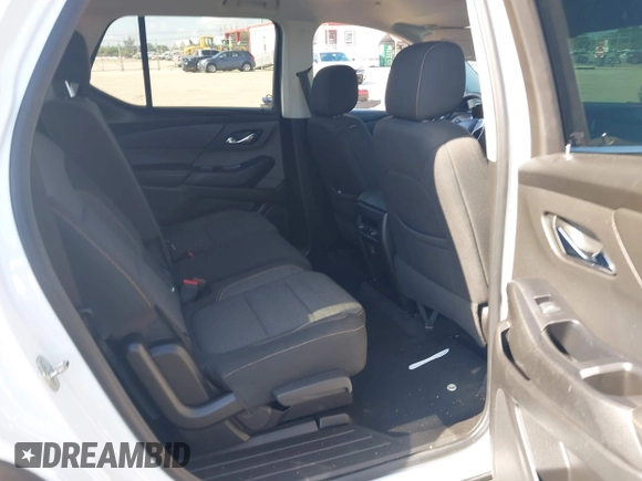 2021 Chevrolet Traverse LS with VIN 1GNERFKW0MJ240592, listed as a IAAI auction lot 42310680 with 59,986 mi miles and . Bid and sale history available at DreamBid. Image 8.