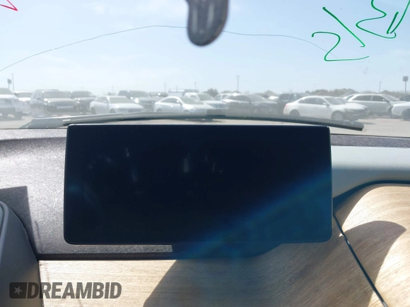 2015 BMW i3 z VIN WBY1Z2C51FV286397, wystawiony jako IAAI lot #41729019 z przebiegiem Nie podano mil oraz . Historia ofert i sprzedaży dostępna na DreamBid. Obrazek 13.