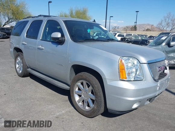 2013 GMC Yukon SLT with VIN 1GKS1CE07DR157076, listed as a IAAI auction lot 41557228 with 148,242 mi miles. Bid and sale history available at carsss.com. Image 1.