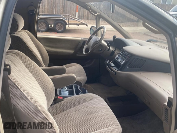 1995 Toyota Previa z VIN JT3AC24S3S1044515, wystawiony jako Copart lot #76413984 z przebiegiem 168 956 mil mil oraz Tytuł czysty. Historia ofert i sprzedaży dostępna na DreamBid. Obrazek 5.
