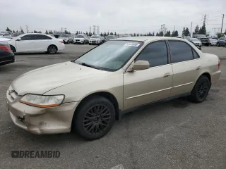 2000 Honda Accord SE with VIN JHMCG6694YC008225, listed as a Copart auction lot 54453885 with 268,282 mi miles and Salvage title. Bid and sale history available at DreamBid. Image 1.