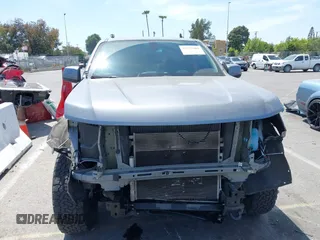 2022 Chevrolet Colorado 4WD Work Truck with VIN 1GCGTBEN2N1148111, listed as a IAAI auction lot 42327481 with 56,506 mi miles and . Bid and sale history available at DreamBid. Image 13.