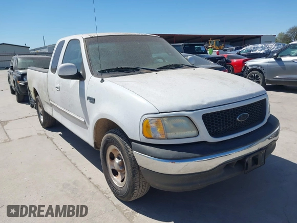 2002 Ford F-150 XL with VIN 1FTRX17232NA78925, listed as a IAAI auction lot 41851582 with 43 mi miles. Bid and sale history available at carsss.com. Image 1.
