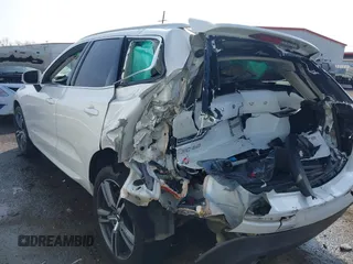 2019 Volvo XC60 Momentum with VIN LYV102DK0KB219297, listed as a IAAI auction lot 41781458 with 80,524 mi miles and . Bid and sale history available at DreamBid. Image 3.