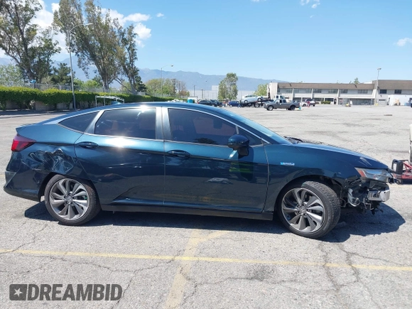 2018 Honda Clarity Plug-In Hybrid Touring with VIN JHMZC5F39JC022655, listed as a IAAI auction lot 42149002 with 118,913 mi miles. Bid and sale history available at carsss.com. Image 13.