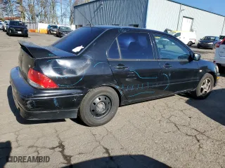 2002 Mitsubishi Lancer OZ-Rally with VIN JA3AJ86E92U027551, listed as a Copart auction lot 45020575 with 214,575 mi miles and Salvage Title. Bid and sale history available at carsss.com. Image 3.