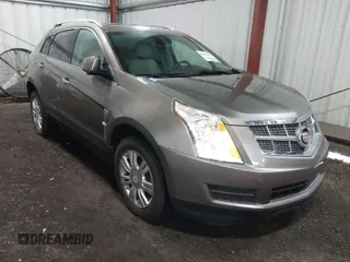 2012 Cadillac SRX Luxury Collection with VIN 3GYFNAE39CS576164, listed as a IAAI auction lot 42021613 with 153,262 mi miles. Bid and sale history available at carsss.com. Image 1.