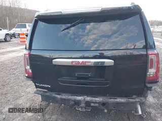 2016 GMC Yukon Denali with VIN 1GKS2CKJ2GR412201, listed as a IAAI auction lot 41185716 with 124,421 mi miles. Bid and sale history available at carsss.com. Image 16.