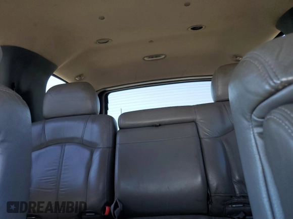 2002 Chevrolet Tahoe Z71 z VIN 1GNEK13T72R285197, wystawiony jako Copart lot #53784905 z przebiegiem 226 662 mil mil oraz Szkoda całkowita • Salvage title. Historia ofert i sprzedaży dostępna na DreamBid. Obrazek 10.