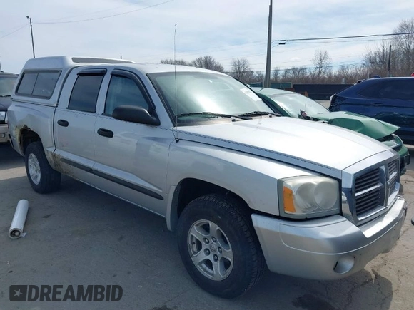 2007 Dodge Dakota SLT with VIN 1D7HE48K57S147503, listed as a IAAI auction lot 41858271 with 242,534 mi miles and . Bid and sale history available at DreamBid. Image 1.