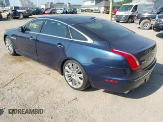 2013 Jaguar XJ Supercharged with VIN SAJWA2GE8DMV43164, listed as a IAAI auction lot 42549807 with 59,744 mi miles and . Bid and sale history available at DreamBid. Image 3.