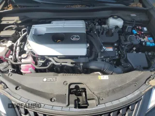 2023 Lexus UX 250h Premium с VIN JTHP9JBHXP2070096, выставлен на аукционе Copart как лот 65645035 с пробегом 9 748 миль миль и Списание • Salvage title. История ставок и продаж доступна на DreamBid. Изображение 11.