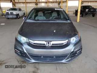 2012 Honda Insight z VIN JHMZE2H38CS004159, wystawiony jako Copart lot #60316925 z przebiegiem 142 601 mil mil oraz Szkoda całkowita • Salvage title. Historia ofert i sprzedaży dostępna na DreamBid. Obrazek 5.