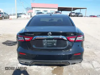 2019 Nissan Maxima Platinum z VIN 1N4AA6AV0KC365901, wystawiony jako IAAI lot #41473793 z przebiegiem 137 772 mil mil oraz . Historia ofert i sprzedaży dostępna na DreamBid. Obrazek 16.