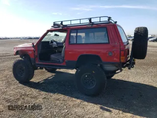 1996 Jeep Cherokee Sport with VIN 1J4FJ67S2TL167992, listed as a Copart auction lot 81329654 with 148,031 mi miles and Non Repairable. Bid and sale history available at carsss.com. Image 2.