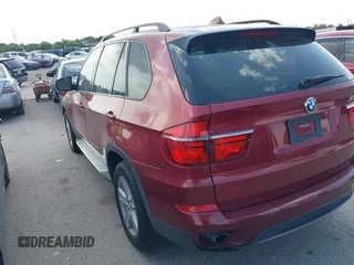 2011 BMW X5 35d with VIN 5UXZW0C52BL369293, listed as a IAAI auction lot 42477394 with 193,094 mi miles and . Bid and sale history available at DreamBid. Image 3.