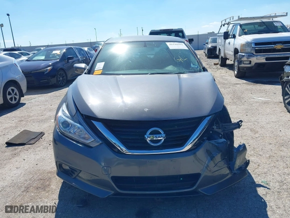 2018 Nissan Altima 2.5 SV with VIN 1N4AL3AP1JC102695, listed as a IAAI auction lot 40440992 with 58,063 mi miles. Bid and sale history available at carsss.com. Image 12.
