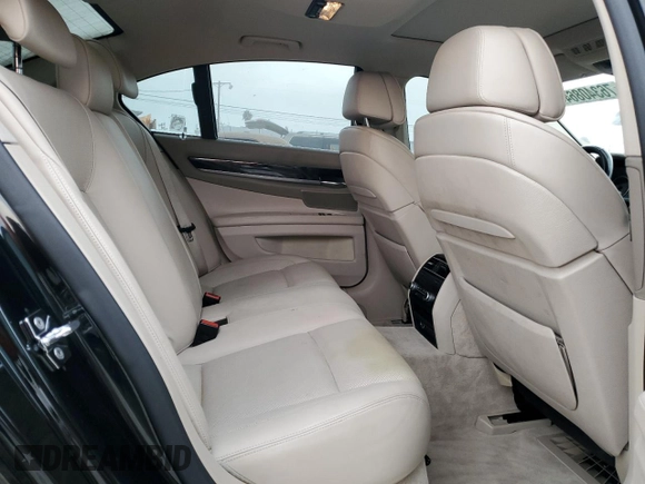 2009 BMW 7 Series 750i с VIN WBAKA83559CY33118, выставлен на аукционе Copart как лот 76340864 с пробегом 99 857 миль миль и Списание • Salvage title. История ставок и продаж доступна на DreamBid. Изображение 11.