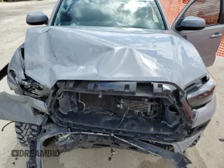 2020 Toyota Tacoma SR5 z VIN 3TMAZ5CN0LM115004, wystawiony jako Copart lot #55343295 z przebiegiem 82 865 mil mil oraz Nie do naprawy • Non repairable. Historia ofert i sprzedaży dostępna na DreamBid. Obrazek 11.